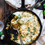 One Pot Pumpkin Rice Casserole - This rice casserole only requires one pot, under 10 ingredients and has lots of cheesy, pumpkin taste! It's an easy, gluten free, healthy fall dinner that is sure to be a crowd pleaser! | Foodfaithfitness.com | @FoodFaithFit