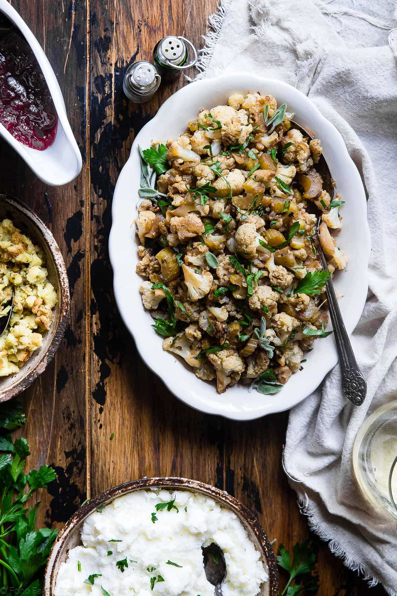 Cauliflower Low Carb Paleo Vegan Stuffing - Made entirely from vegetables but has all the flavor of traditional bread stuffing! It's super easy, whole30 compliant, paleo, vegan, gluten free and SO delicious! Perfect for Thanksgiving or Christmas! | Foodfaithfitness.com | @FoodFaithFit