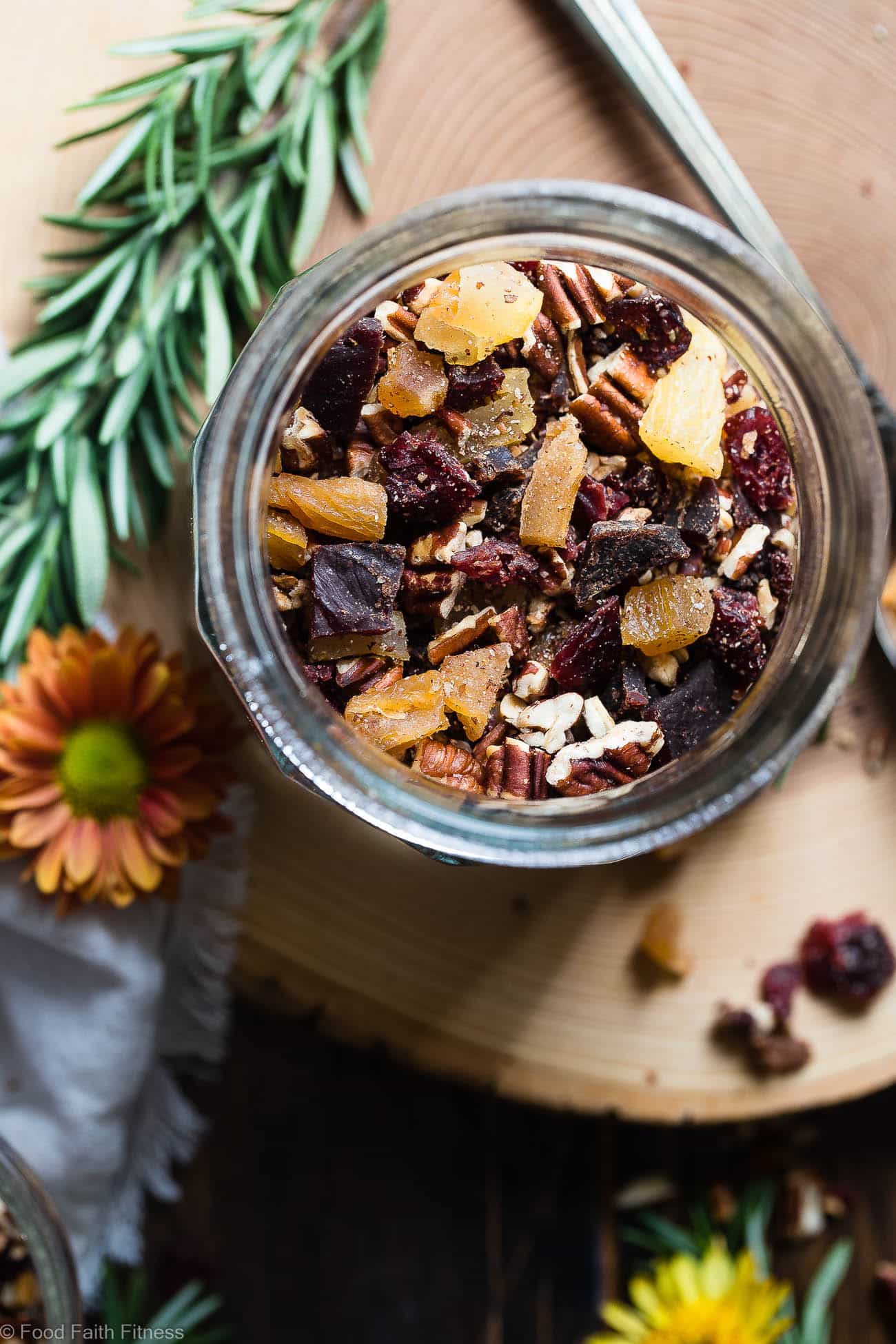 Protein Packed Fall Trail Mix - This quick and easy fall trail mix recipe only uses 6 ingredients and is secretly high in protein! It's a healthy gluten, grain and dairy free portable snack for busy days that is adult and kid friendly! | Foodfaithfitness.com | @FoodFaithFit