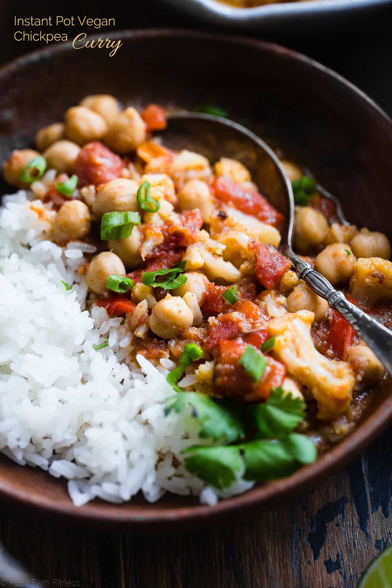 Instant Pot Easy Vegan Cauliflower Chickpea Curry - This easy chickpea curry is made in the Instant Pot and ready in 20 mins! It uses coconut milk and tomatoes to make it thick and so creamy! Makes great leftovers and is great for meal prep! | Foodfaithfitness.com | @FoodFaithFit