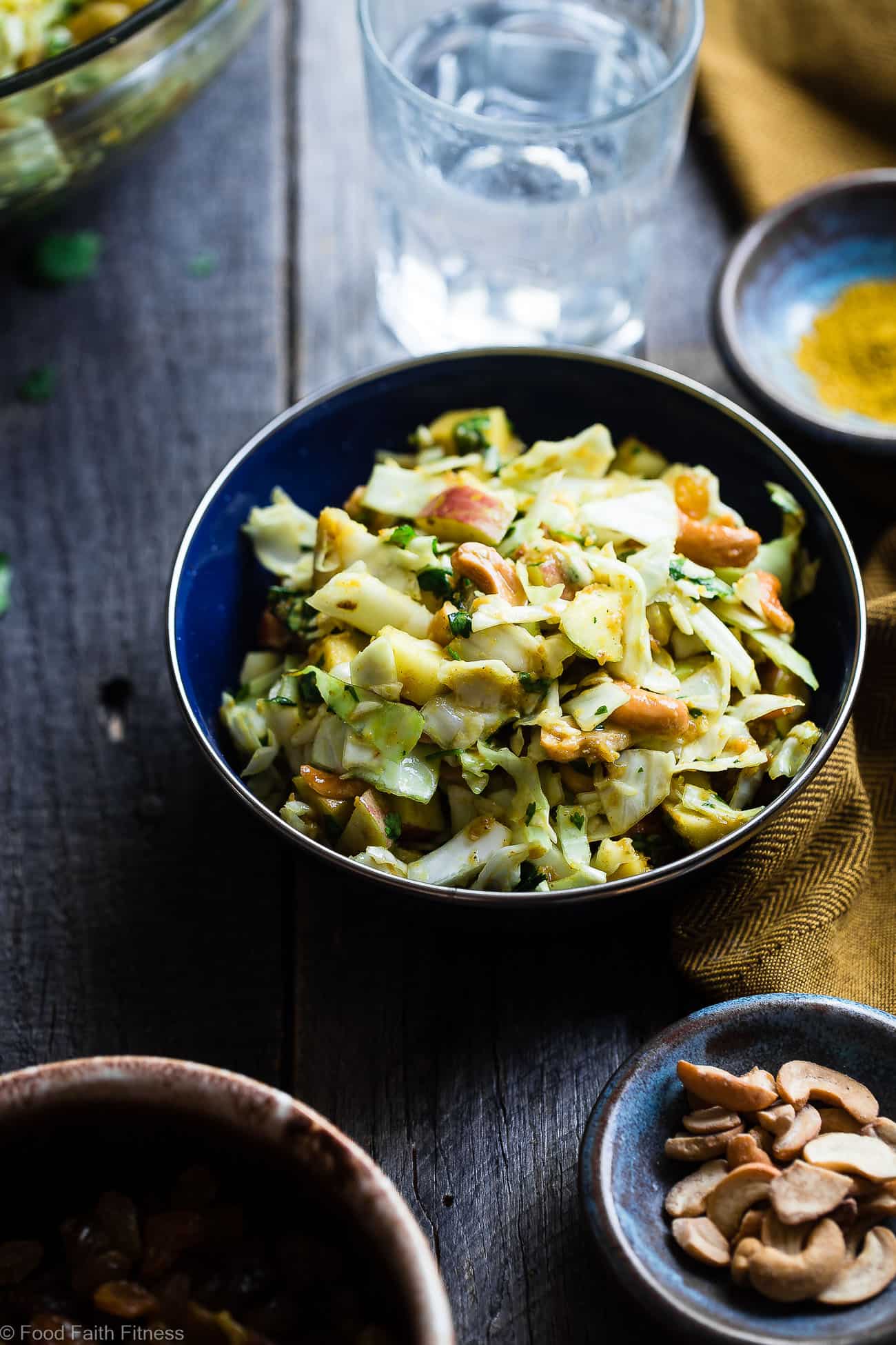 Curry Cashew Shredded Cabbage Salad with Apples - A sugar and gluten free healthy salads with cabbage that is mixed with a creamy curry dressing and crunchy cashews! A healthy, paleo and whole30 side dish that everyone will love! | Foodfaithfitness.com | @FoodFaithFit