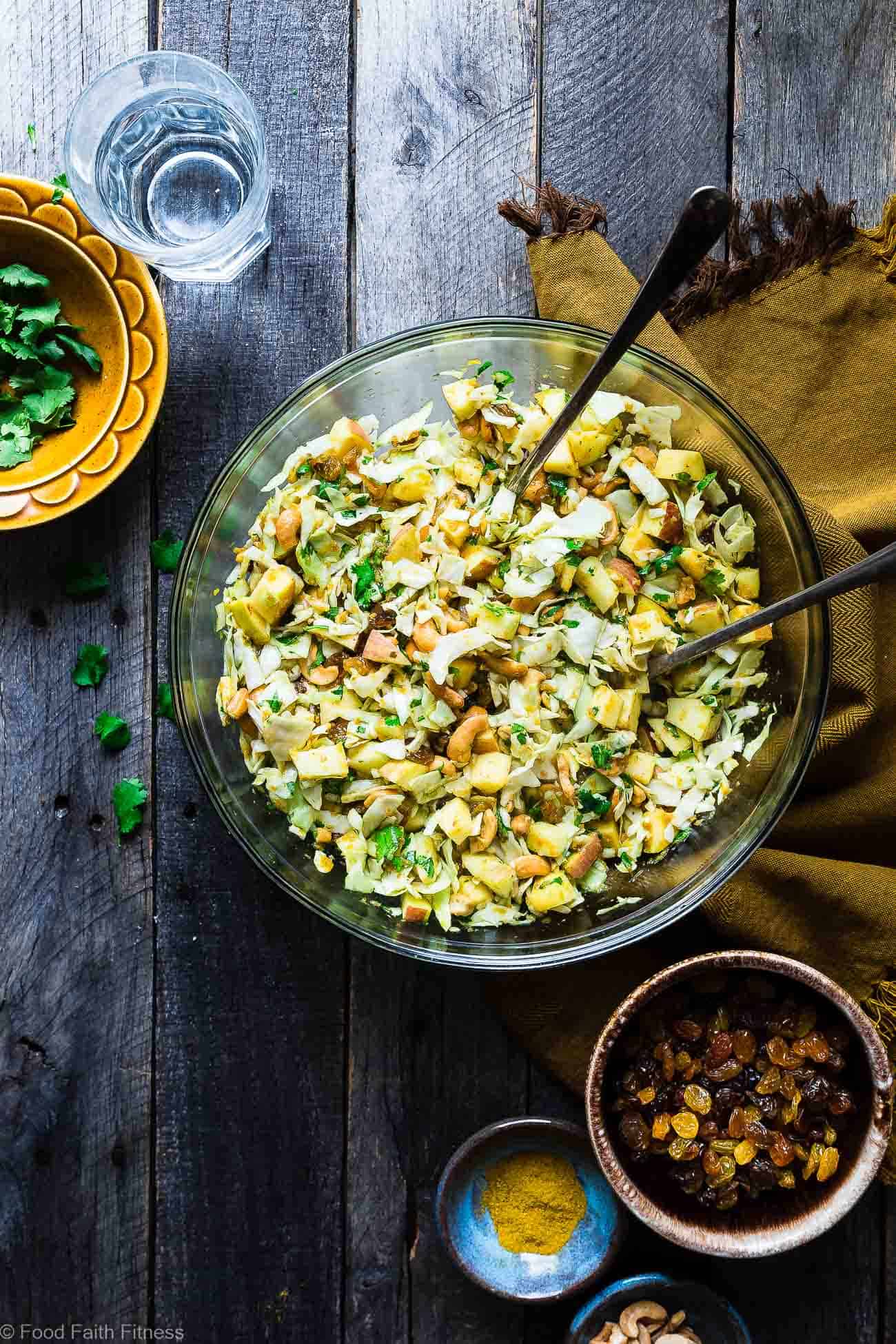 Curry Cashew Shredded Cabbage Salad with Apples - A sugar and gluten free healthy salad that is mixed with a creamy curry dressing and crunchy cashews! A healthy, paleo and whole30 side dish that everyone will love! | Foodfaithfitness.com | @FoodFaithFit