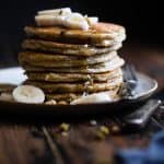 Easy Paleo Banana Pancakes - These quick and easy banana pancakes are naturally sweetened, gluten, grain and dairy free and SO light and fluffy! The perfect healthy start to your day or weekend breakfast! | Foodfaithfitness.com | @FoodFaithFit