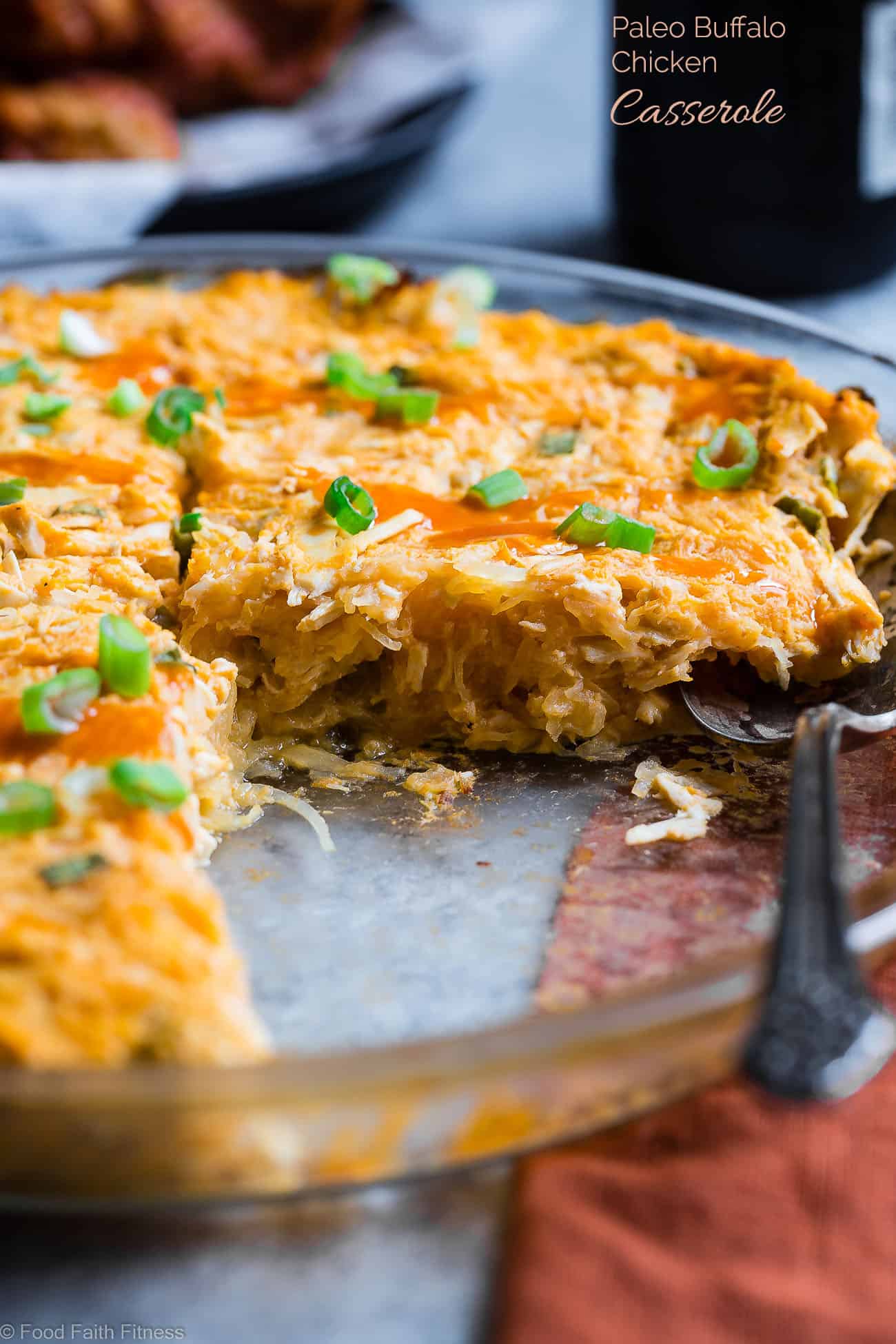 Paleo Buffalo Chicken Baked Spaghetti Squash Casserole -  This EASY, keto and whole30 casserole is only 7 ingredients, 320 calories and packed with protein! It's a family friendly, low carb, weeknight dinner that even picky eaters will love! | #Foodfaithfitness | #Keto #paleo #glutenfree #whole30 #kidfriendly