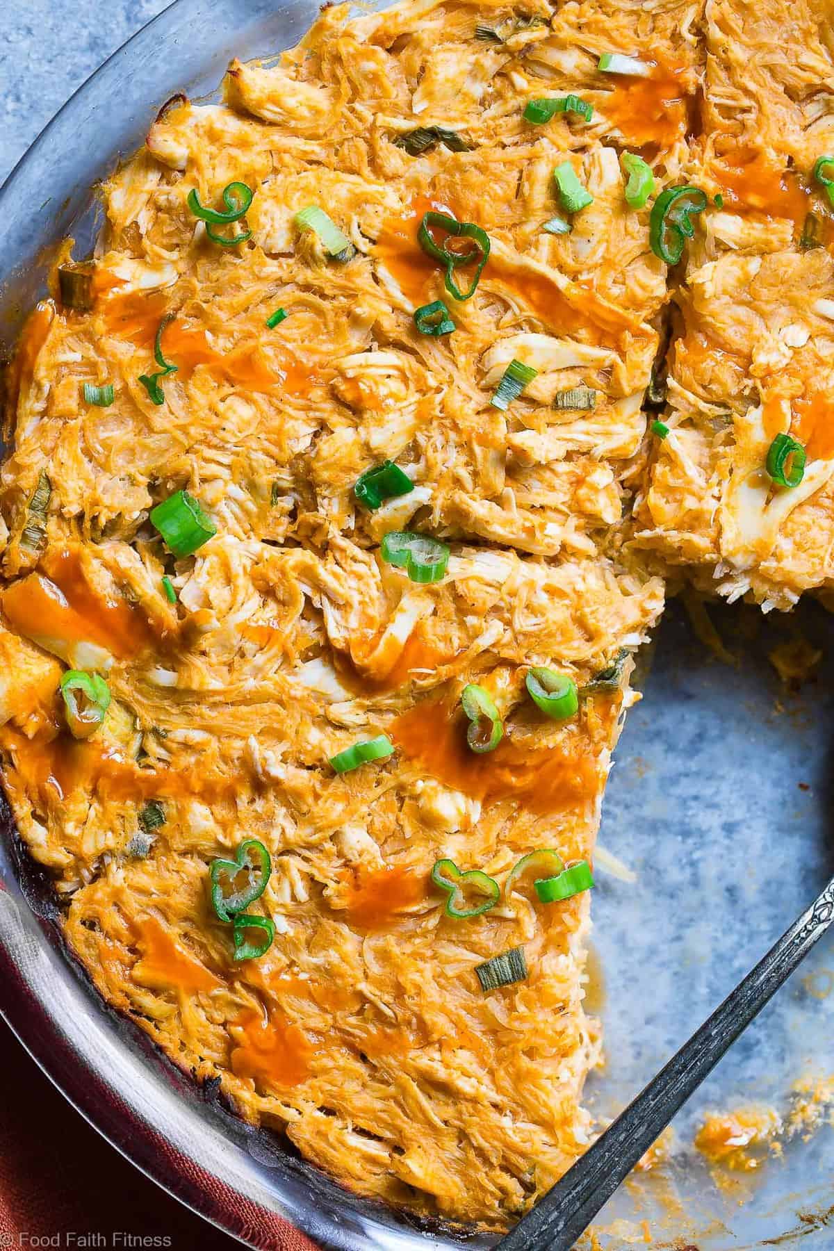 close up of whole30 buffalo chicken casserole in a serving dish