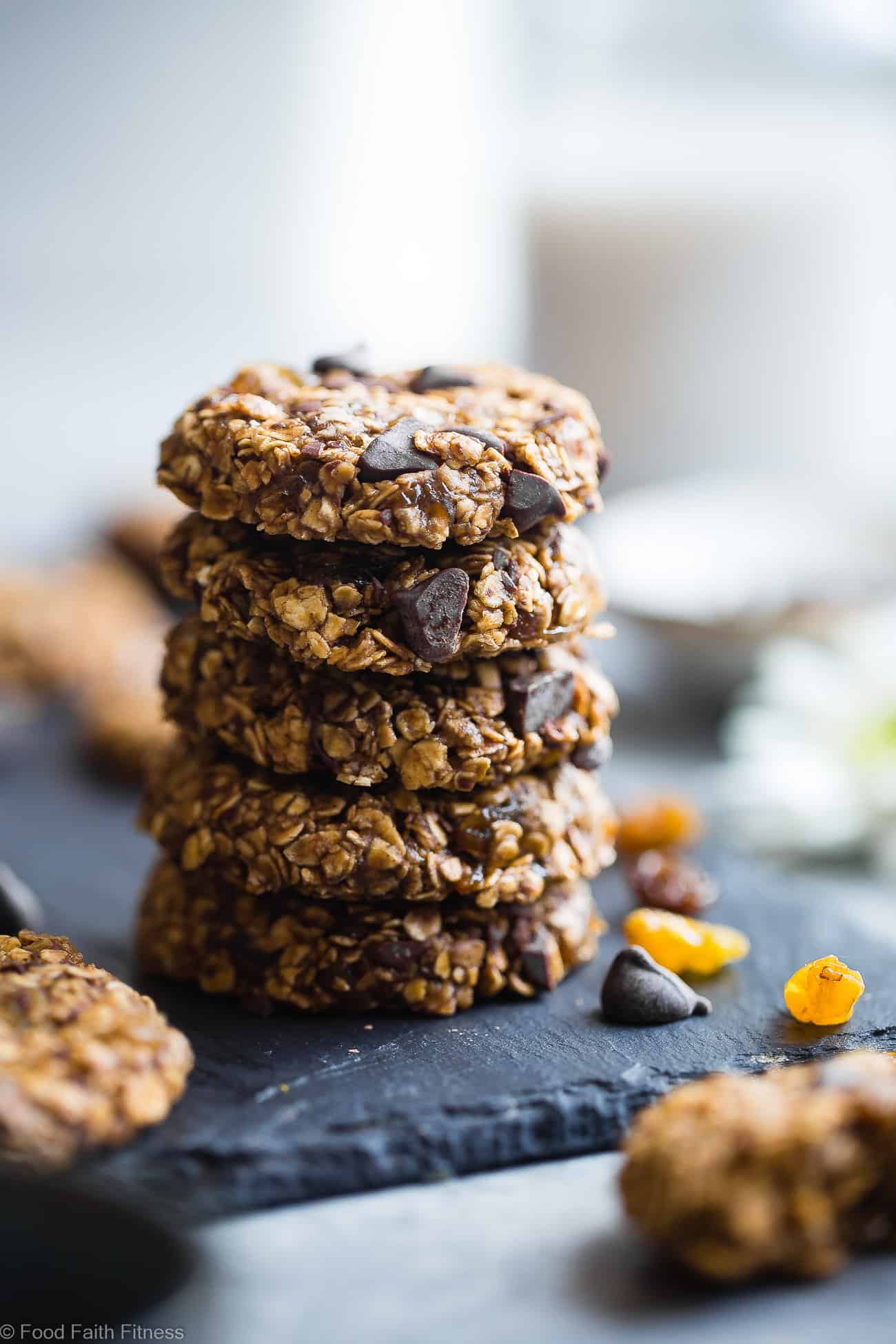 Vegan Gluten Free Oatmeal No Bake Cookies - These EASY, no bake oatmeal cookies have a surprise tahini twist, chocolate and notes of spicy cardamon and chewy golden raisins! A healthy, gluten/dairy/egg free treat for only 110 calories! | #Foodfaithfitness | #Vegan #NoBake #Healthy #ChocolateChip #Glutenfree