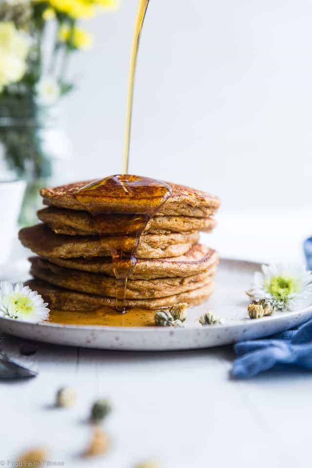 Gluten Free Paleo Sweet Potato Pancakes - SO fluffy and tender that you won't believe they're made without butter or oil! Perfect for a healthy breakfast and freezes great for busy mornings! | #Foodfaithfitness | #Glutenfree #Paleo #Healthy #Dairyfree #Pancakes