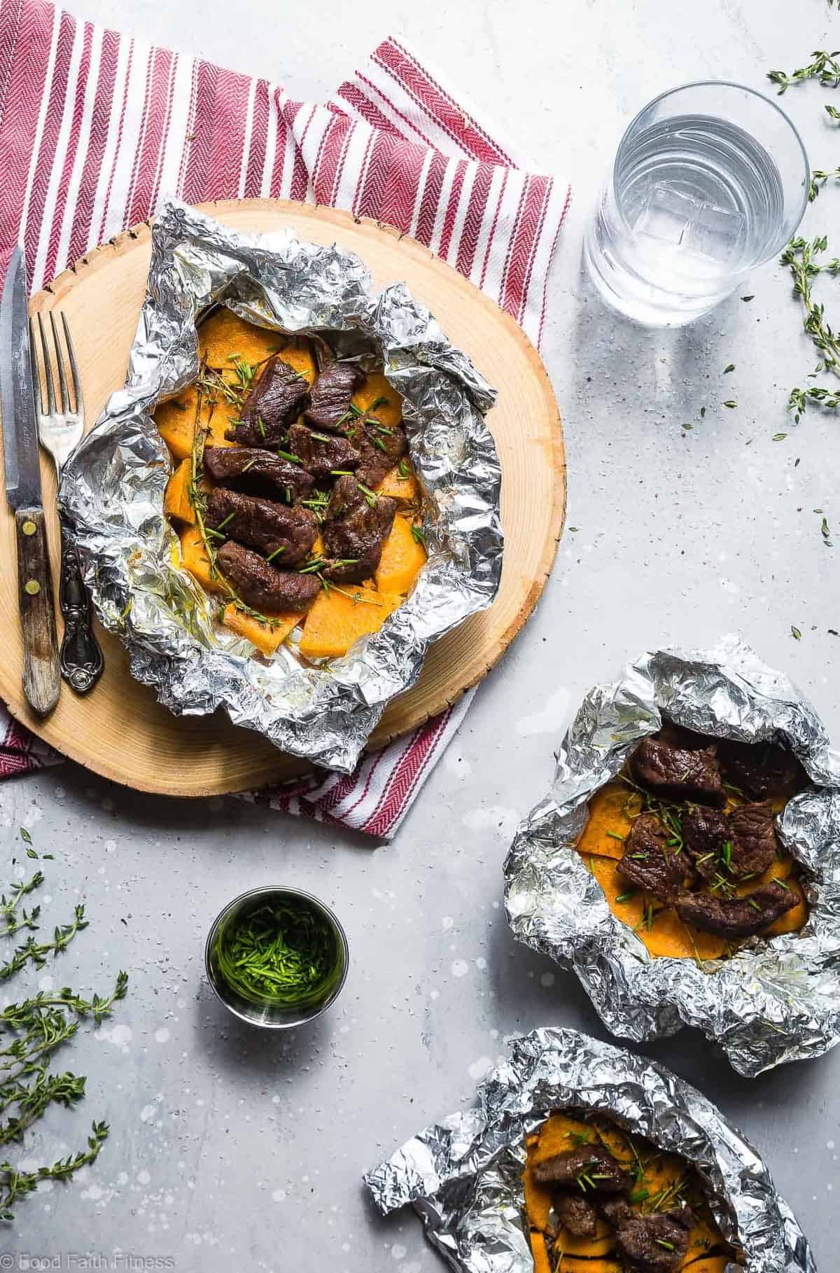 Garlic Steak and Potato Foil Packets - These EASY Steak Foil Packets are an easy, healthy and whole30 approved summer dinner with only 6 ingredients and 300 calories! Sure to please even the pickiest of eaters! | #Foodfaithfitness | #Glutenfree #Paleo #Whole30 #Grilling #Dairyfree