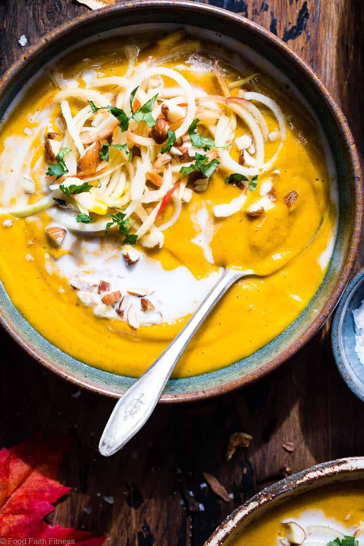 Slow Cooker Creamy Fall Vegan Sweet Potato Soup - this healthy sweet potato soup is made in the slow cooker for an EASY weeknight dinner that is loaded with spicy-sweet, cozy flavor! Gluten free, paleo and SO creamy and delicious! | #Foodfaithfitness | #Paleo #Glutenfree #Vegan #Dairyfree #slowcooker