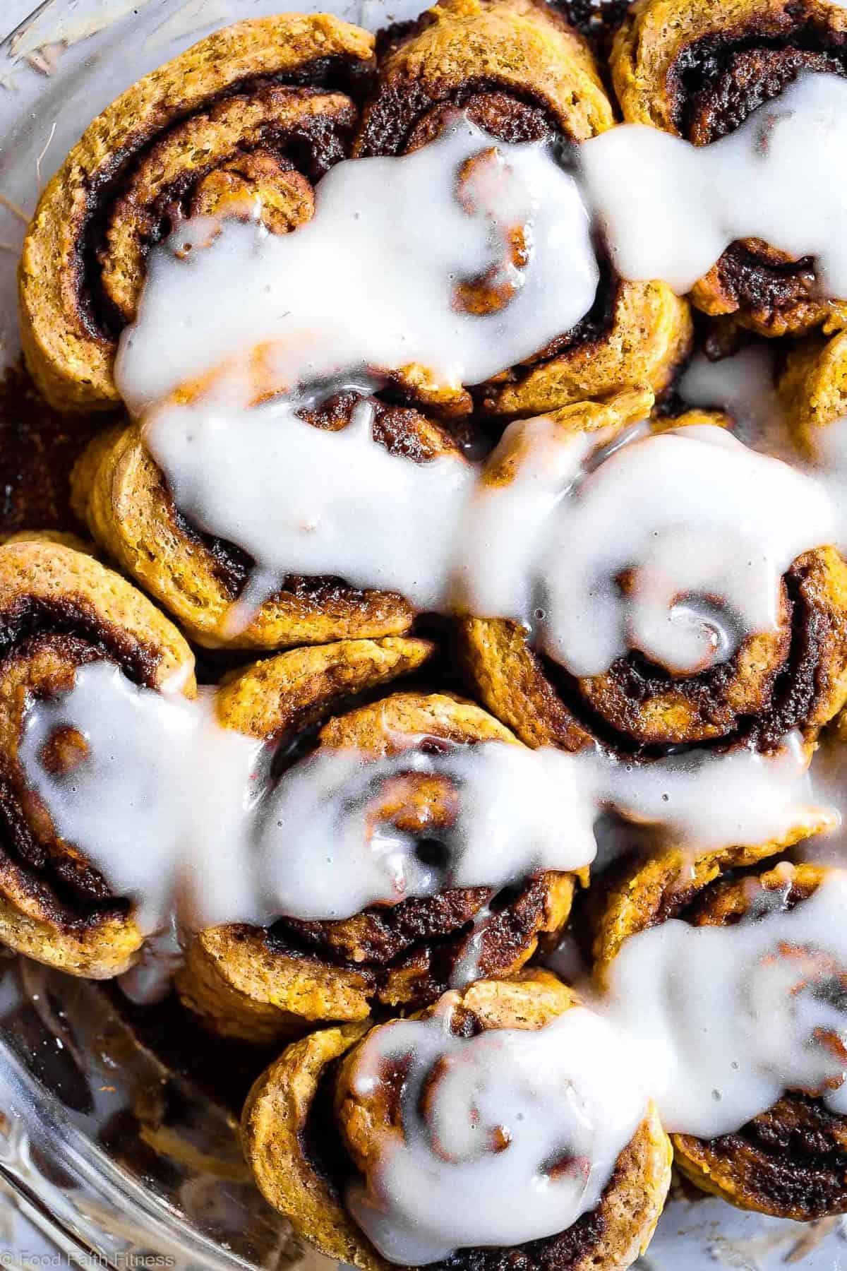 Gluten Free Vegan Pumpkin Cinnamon Rolls - These easy Pumpkin Spice Cinnamon Rolls are so soft and fluffy you won't believe they're gluten, dairy and egg free! Loaded with spicy-sweet fall flavor and SO delicious! | #Foodfaithfitness | #Glutenfree #vegan #dairyfree #eggfree #pumpkin