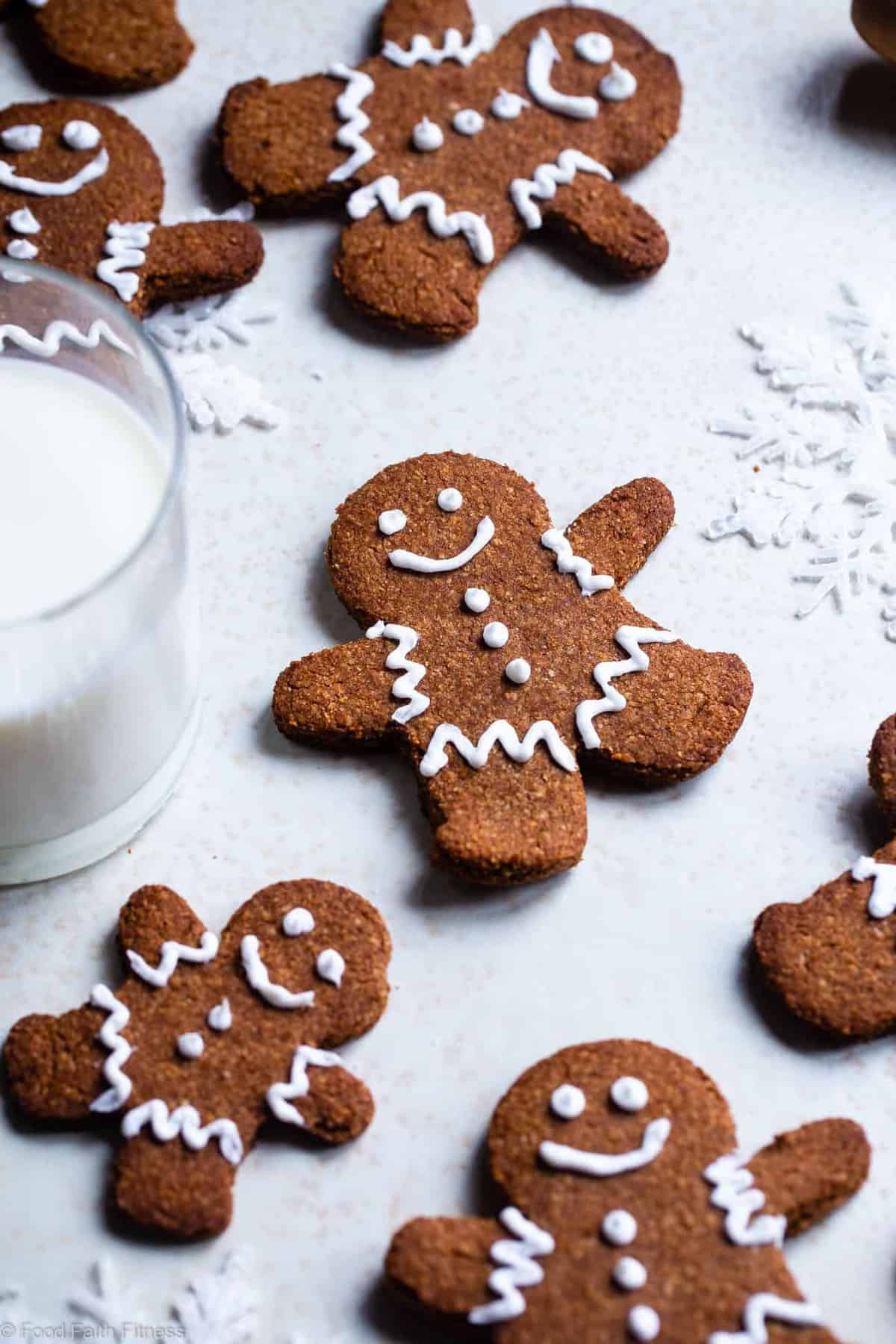 Gluten Free Paleo Healthy Gingerbread Cookies - These gingerbread cookies are perfectly spicy, sweet and crispy! An easy, delicious holiday cookie that no one will know are healthy and gluten/grain/dairy/refined sugar free! | #Foodfaithfitness | 