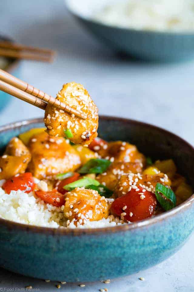 Gluten Free Whole30 Sweet and Sour Chicken - This paleo friendly, healthy sweet and sour chicken is so easy to make and tastes better than takeout and is WAY better for you! It's sugar/grain/gluten/dairy/egg free too! | #Foodfaithfitness | #Glutenfree #Paleo #Whole30 #Healthy #Sugarfree