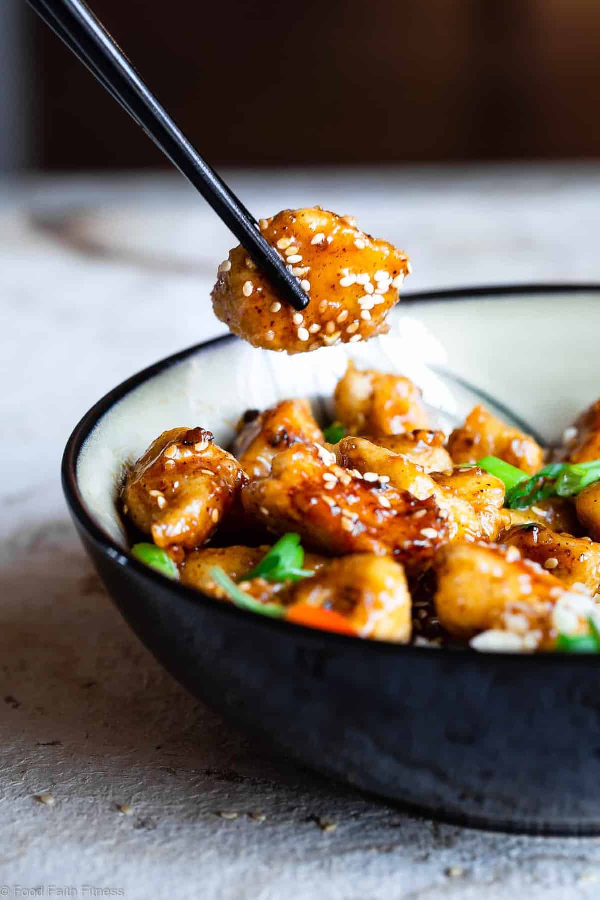 Easy Whole30 Sesame Chicken -Â This paleo friendly, and sugar/grain/dairy and gluten freeÂ CRISPY Sesame Chicken tastes just like takeout but is SO much better for you! AÂ quick dinner that the whole family will love! | #Foodfaithfitness | #Glutenfree #Paleo #Whole30 #Sugarfree #Healthy