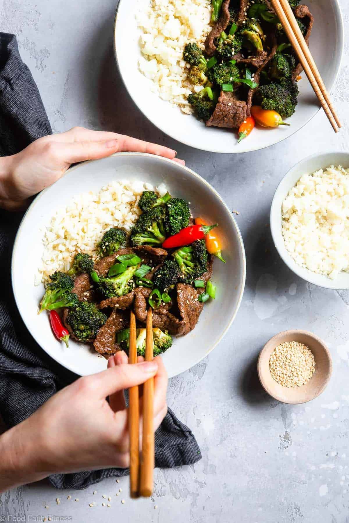 a bowl of Keto Beef and Broccoli being eaten with chopsticks