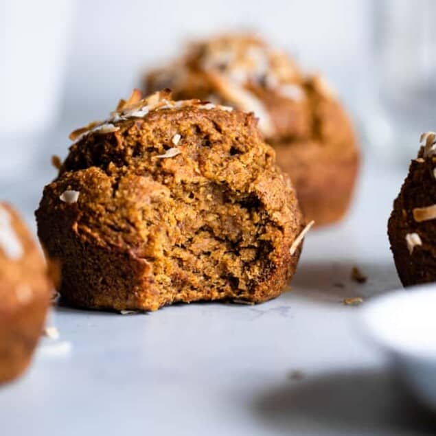 Sugar Free Gluten Free Oatmeal Carrot Muffins - These easy carrot muffins are naturally sweetened with dates and have a surprise, spicy-sweet kick! SO light and fluffy! Gluten free, healthy and tasty! | #Foodfaithfitness | #Glutenfree #Dairyfree #Healthy #Sugarfree #Muffins