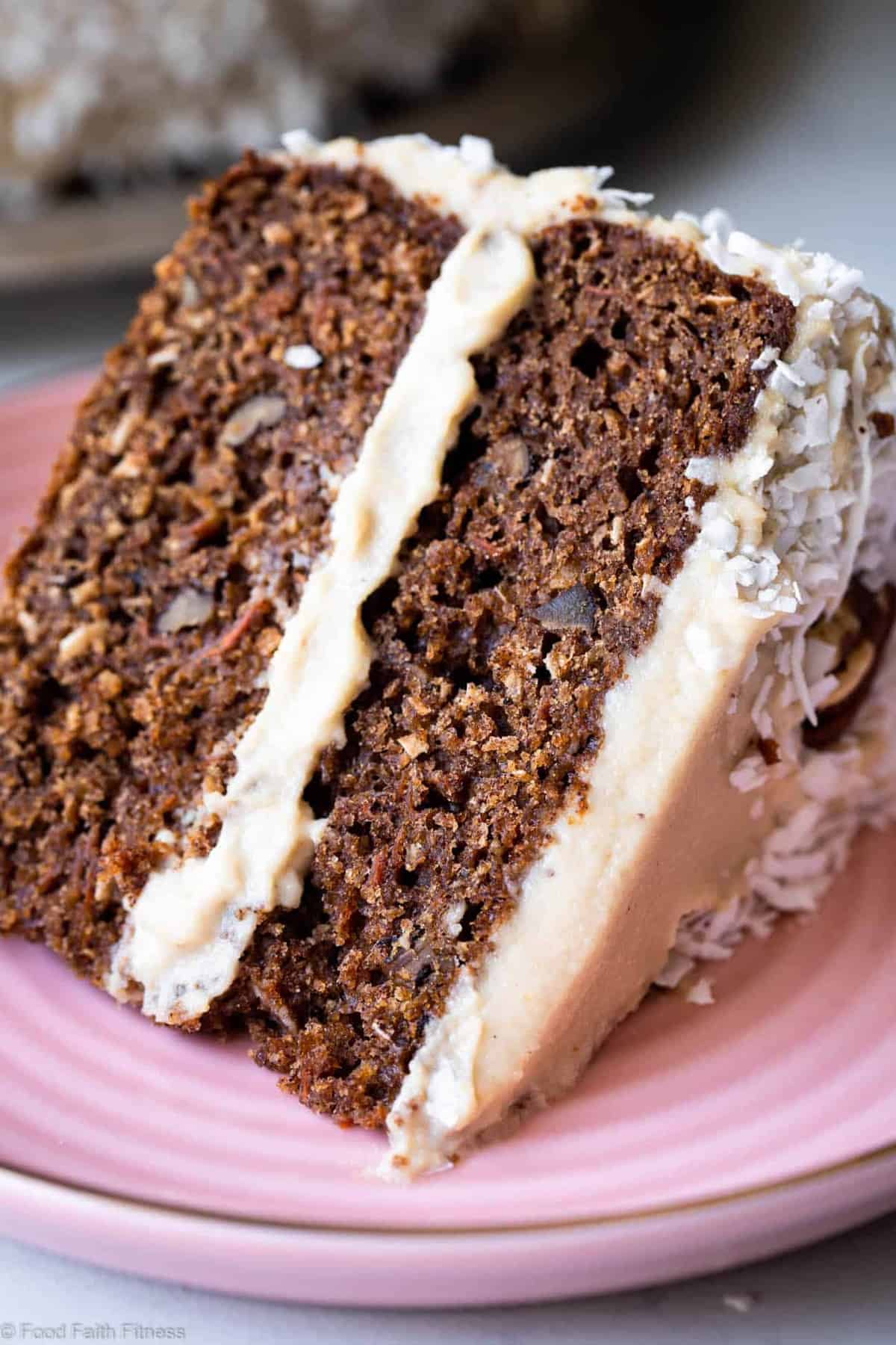 Paleo Carrot Cake - This dairy, grain and gluten free, Paleo Carrot Cake with Almond Flour has a luscious cashew "cream cheese" frosting and is easy to make! Always a hit with a crowd! | #Foodfaithfitness | #Glutenfree #Carrotcake #Paleo #Dairyfree #Healthy