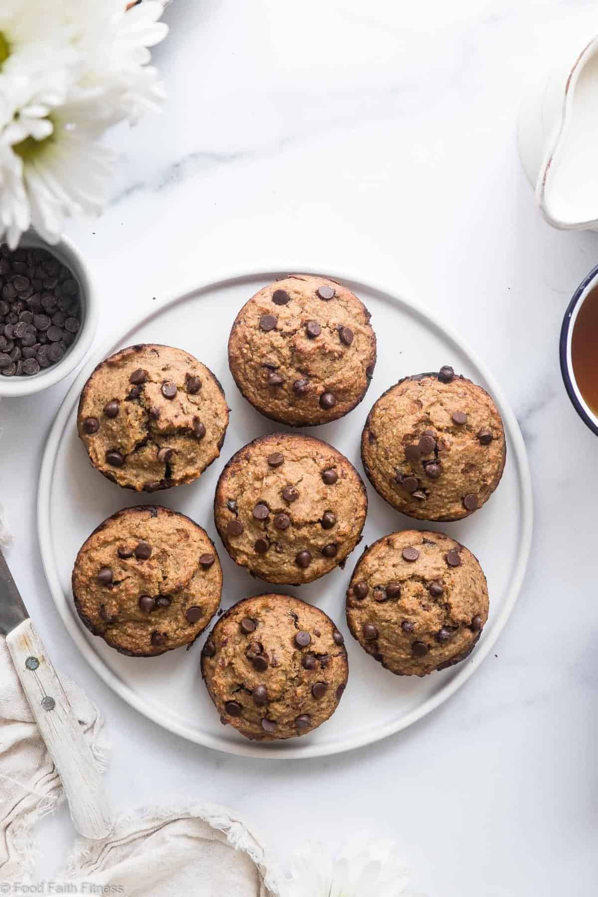 Healthy Gluten Free Zucchini Muffins - These dairy free Zucchini Muffins are fluffy and gluten, dairy, oil and sugar free! Sweetened with dates, studded with chocolate chips and only 170 calories! Great for kids and adults! | #Foodfaithfitness | #Glutenfree #Dairyfree #Healthy #Zucchini #sugarfree