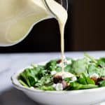 Miso Lemon Tahini Dressing - This Miso Lemon Tahini Dressing Recipe is an easy, creamy dressing that is big on taste, only 35 calories and is SO easy to make! Garlicky, sweet, tangy and so addicting! | #Foodfaithfitness | #Glutenfree #Vegan #healthy #Nutfree #Sugarfree