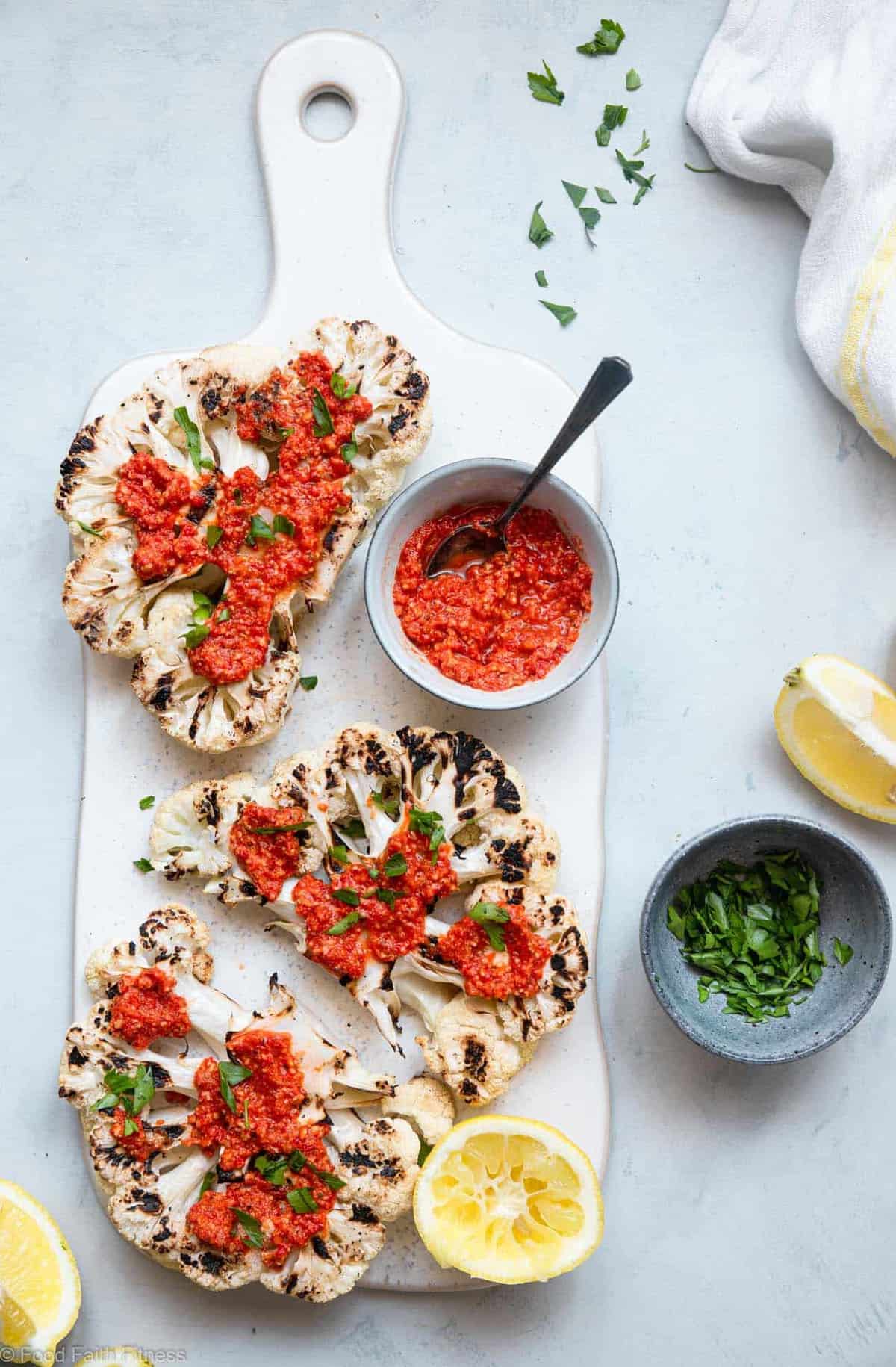 Grilled cauliflower steak laying on a table