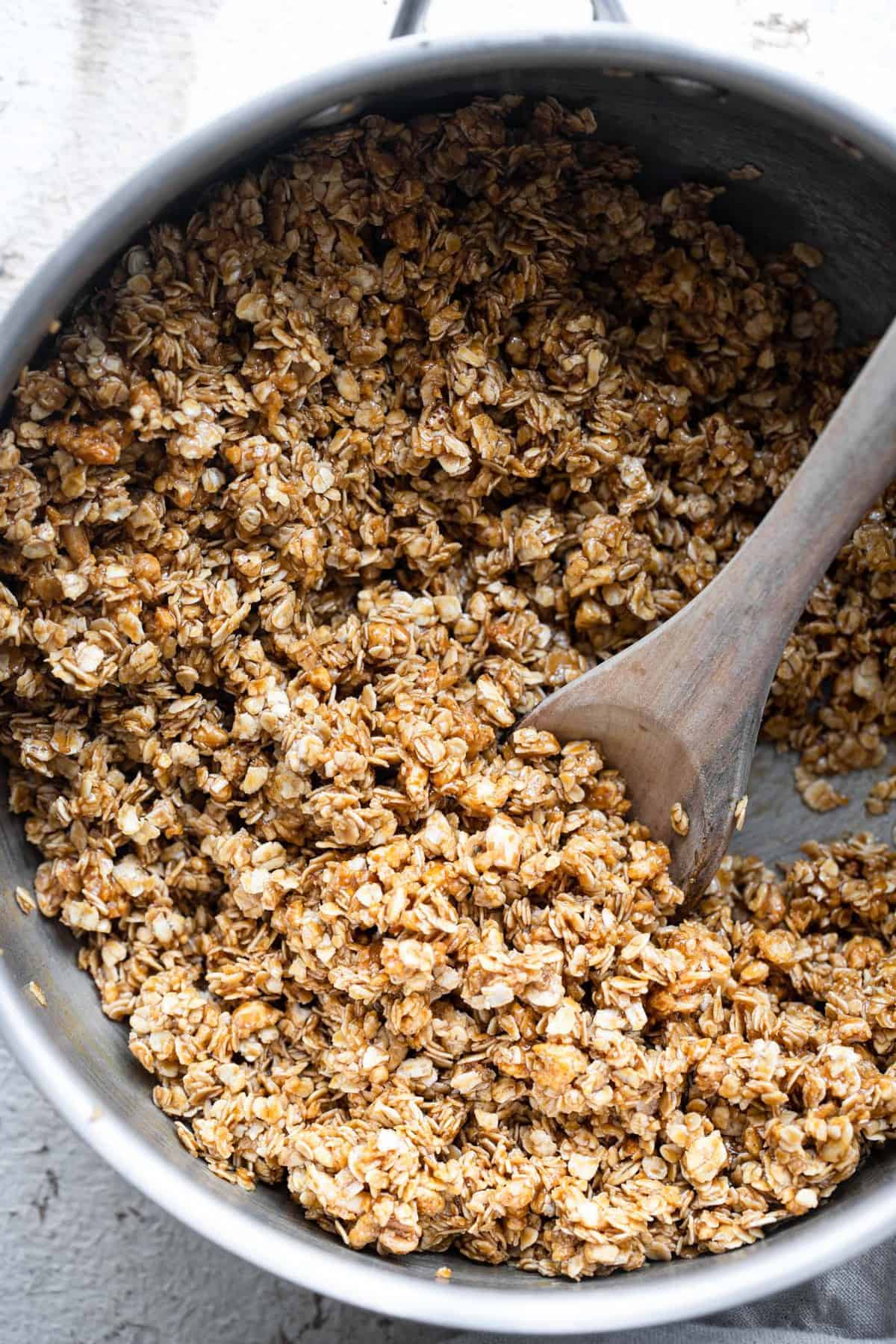 making easy homemade granola bars in a pan