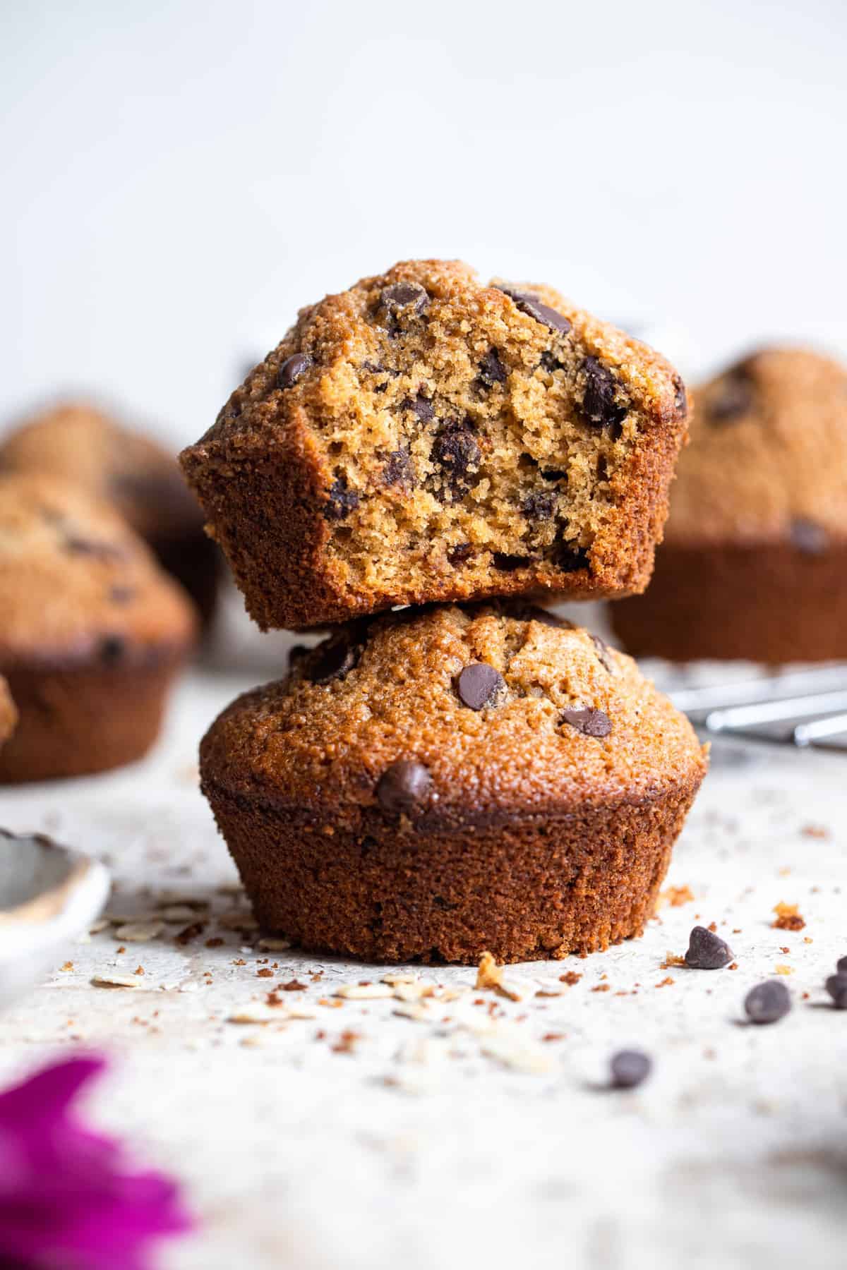 two healthy gluten free chocolate chip muffins stacked on each other