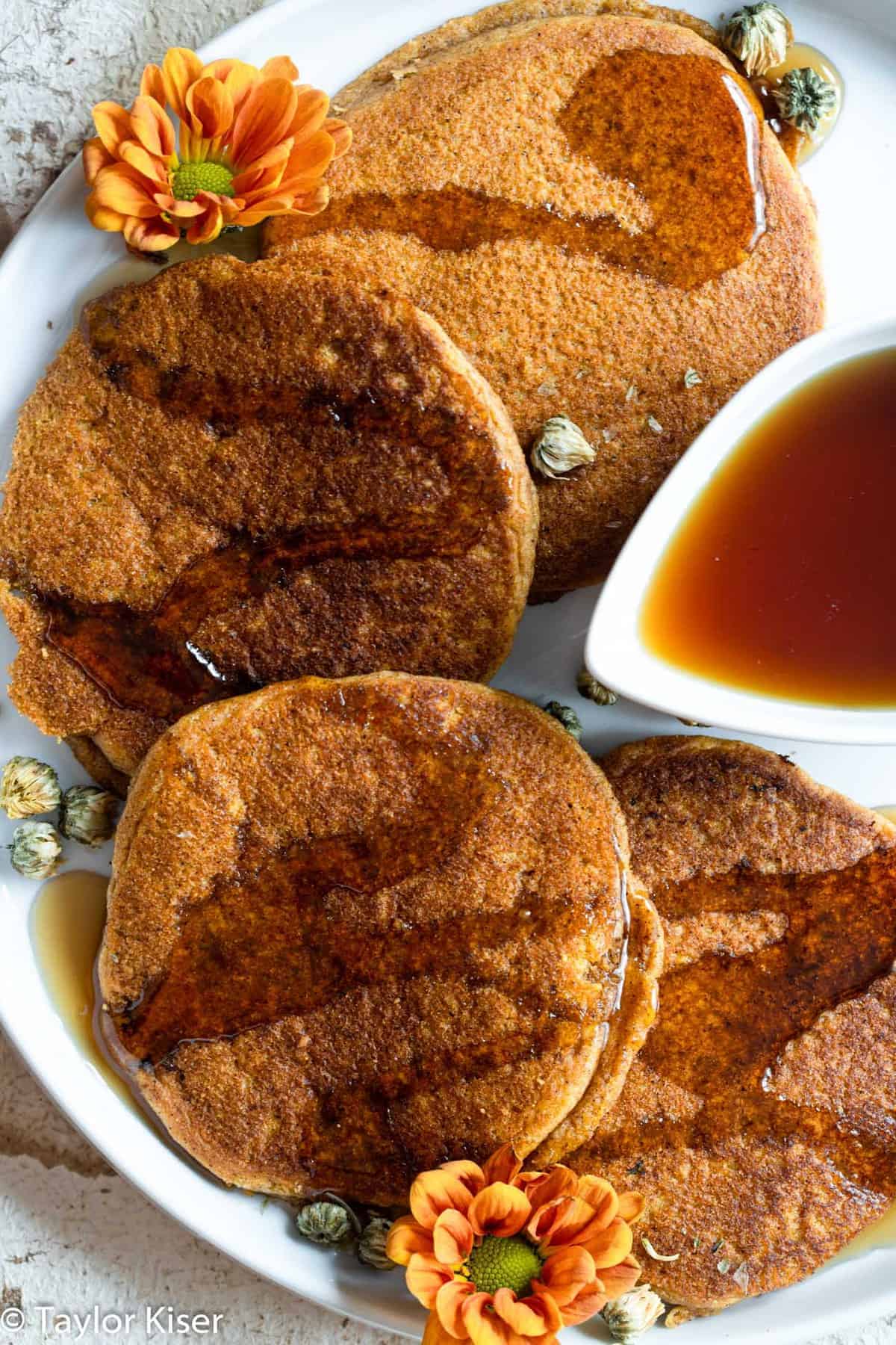 easy pumpkin pancakes layed out on a plate