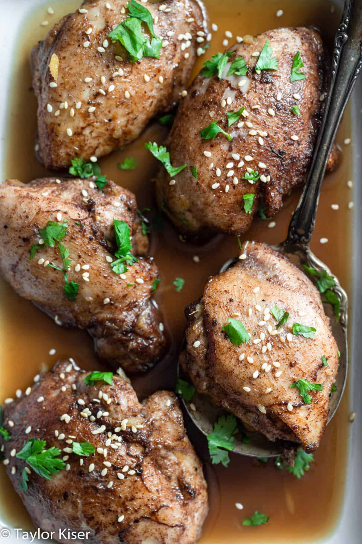 Chinese five spice chicken thighs in a serving bowl