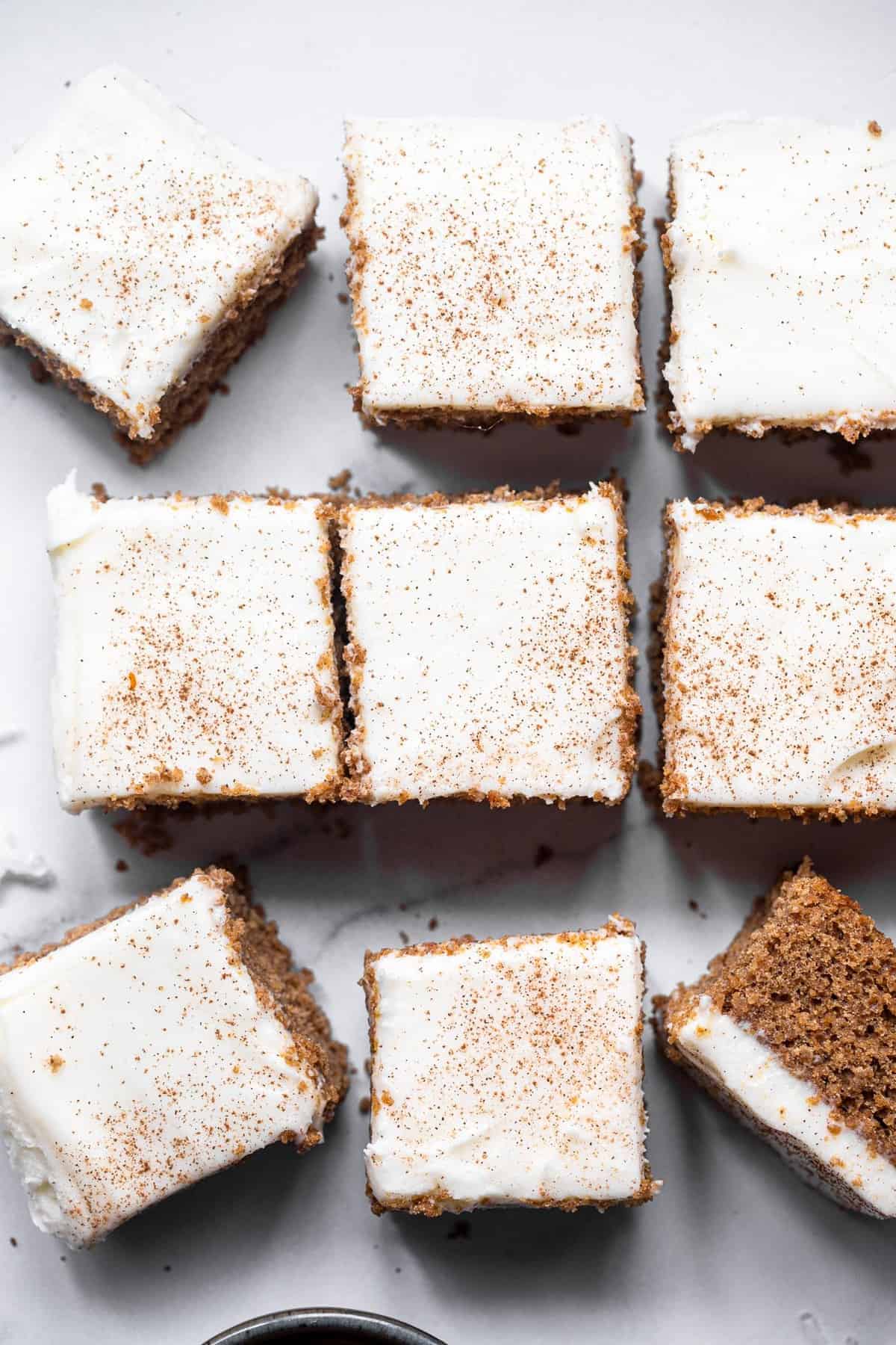 Gluten free gingerbread sliced into squares on a table