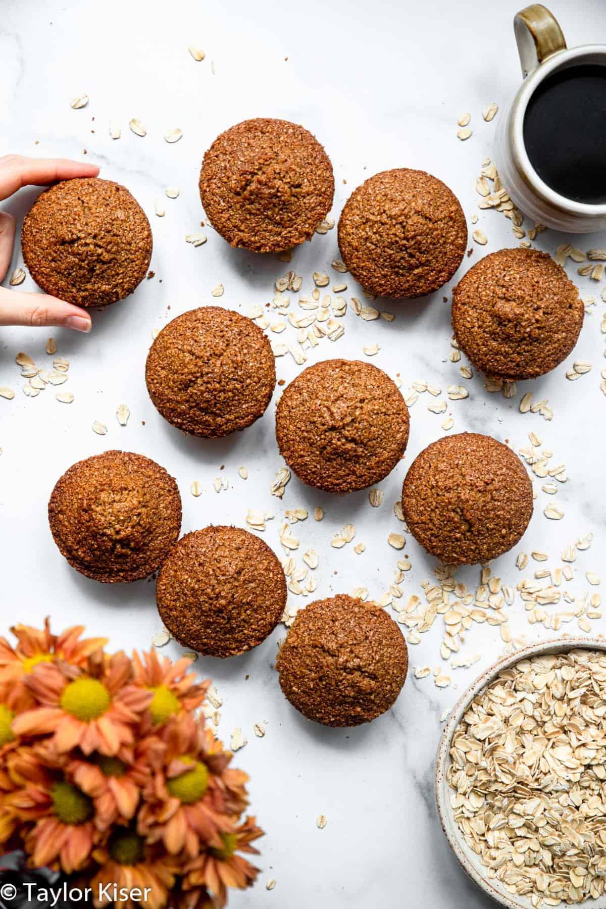 overhead of gluten free oat bran muffins on a table