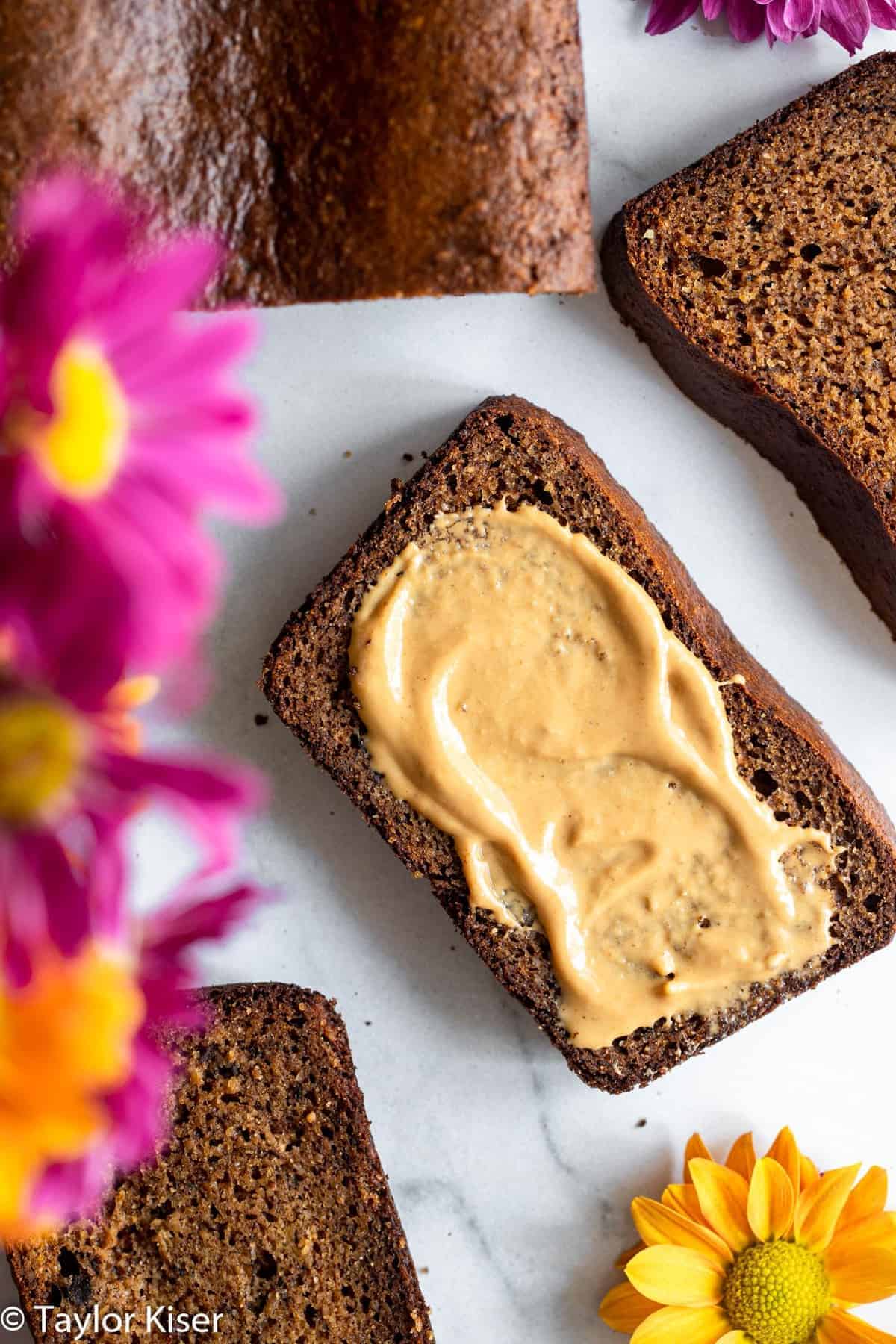 High protein banana bread with cashew butter on it