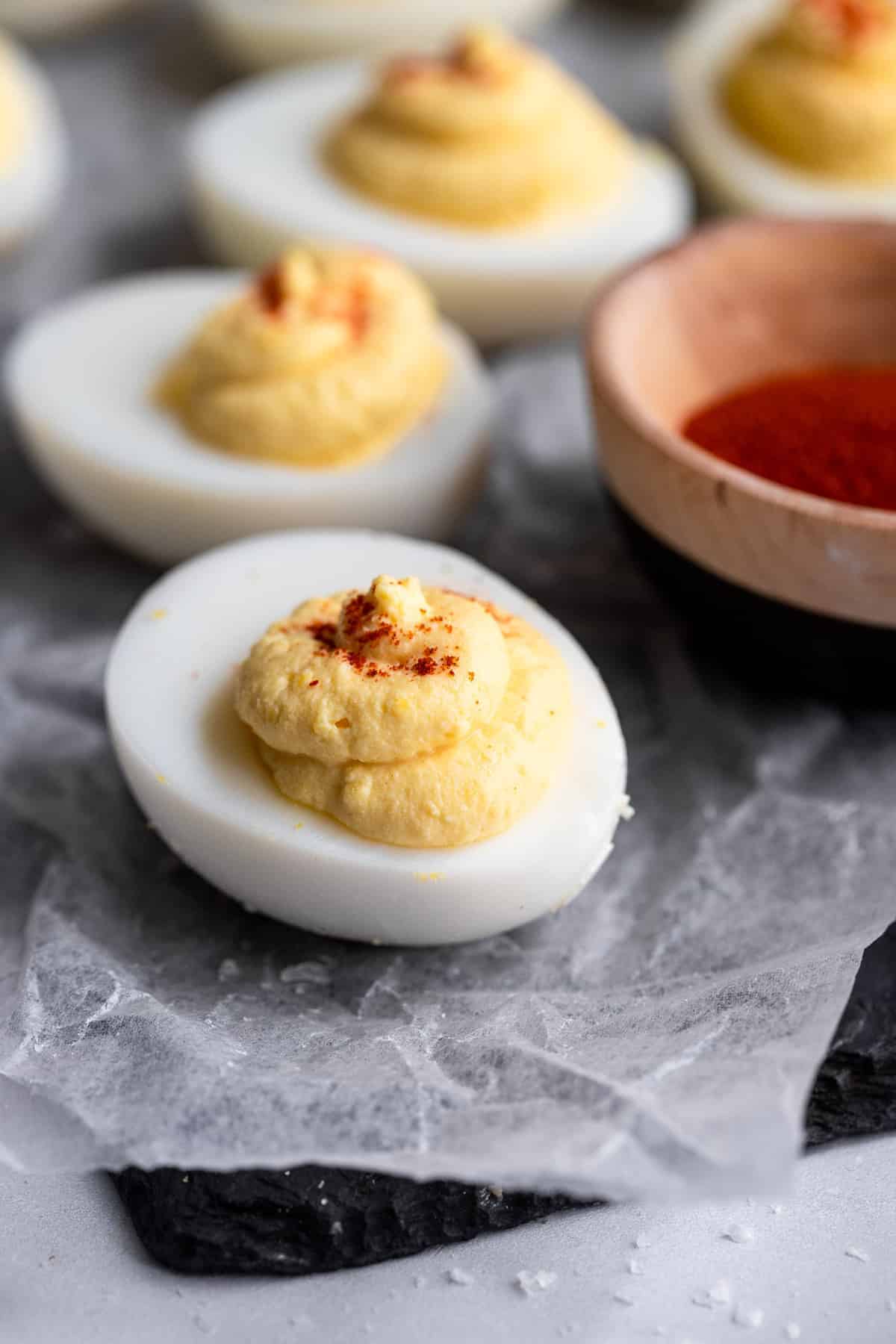 healthy deviled eggs recipe close up of egg with paprika