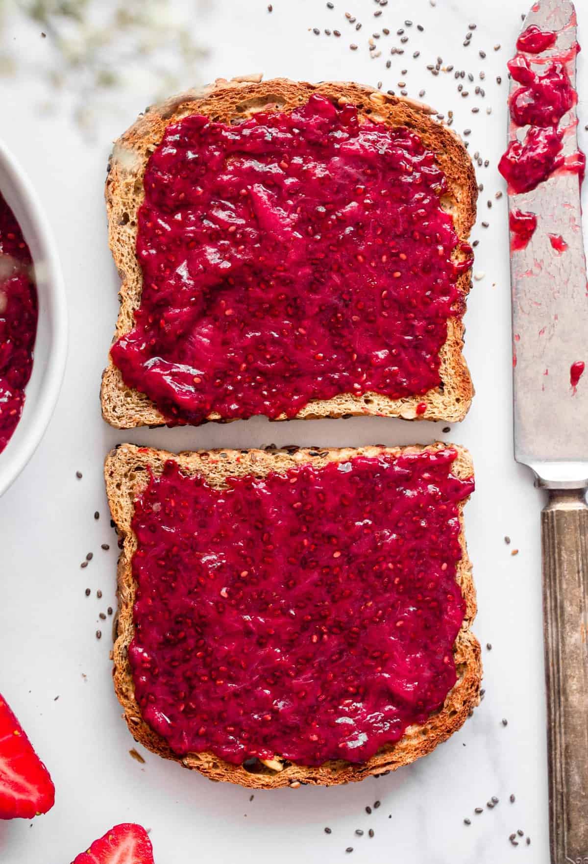 strawberry chia jam spread on 2 slices of toast