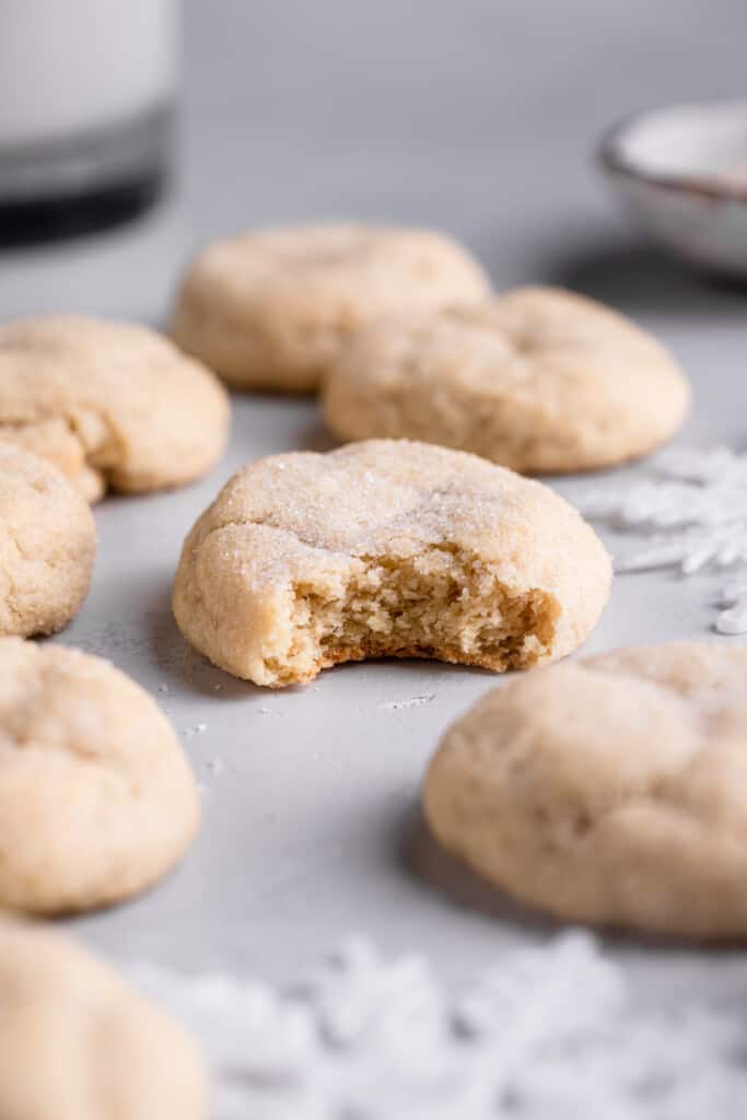 Eggless Sugar Cookies on a table with a bite taken out