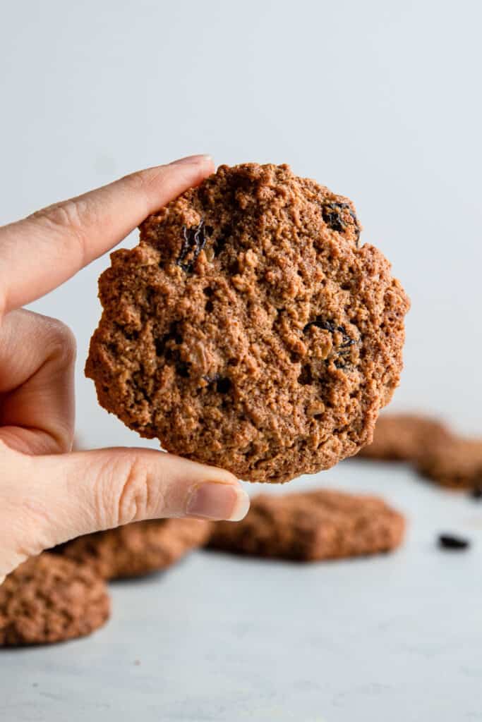 one Almond Flour Oatmeal Cookies being held up