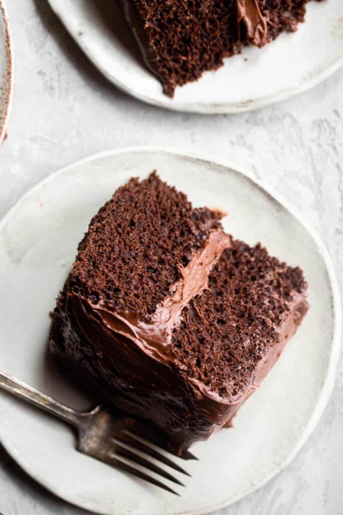 a slice of Dairy Free Chocolate Cake on a small plate