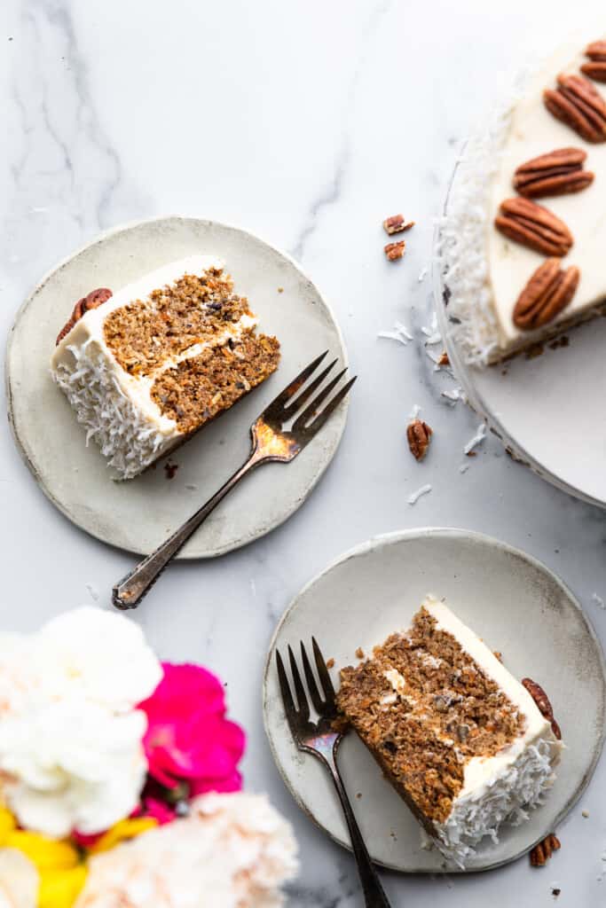 Low Carb Keto Carrot Cake slices on small cake plates