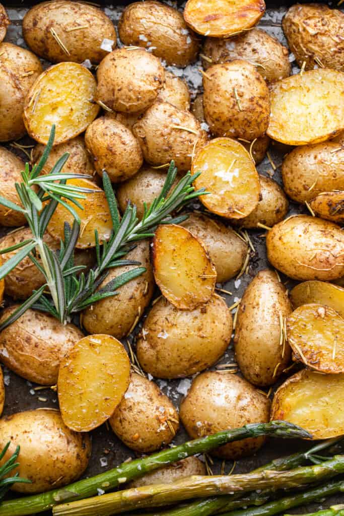 Roasted Potatoes and Asparagus on a baking sheet