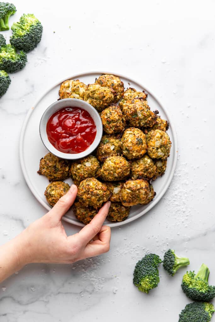 Broccoli Bites arranged on a plate with a side of ketchup