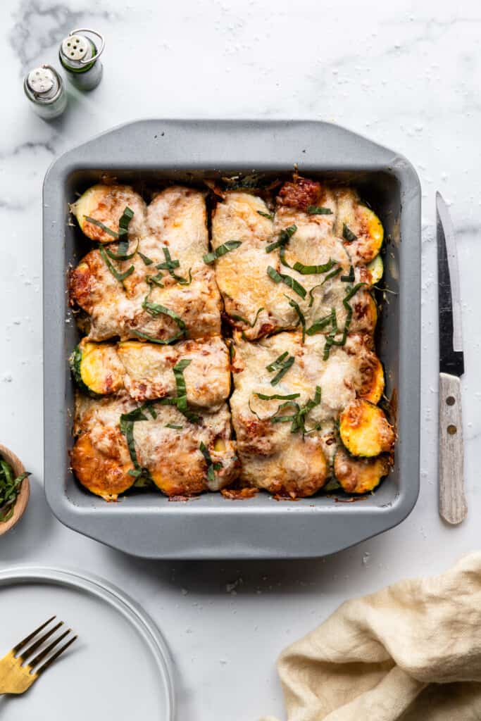 a baking dish filled with Chicken Zucchini Casserole