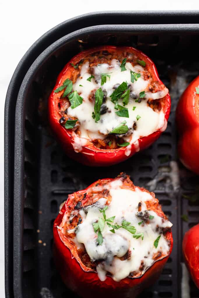 Air Fryer Stuffed Peppers arranged in the air fryer