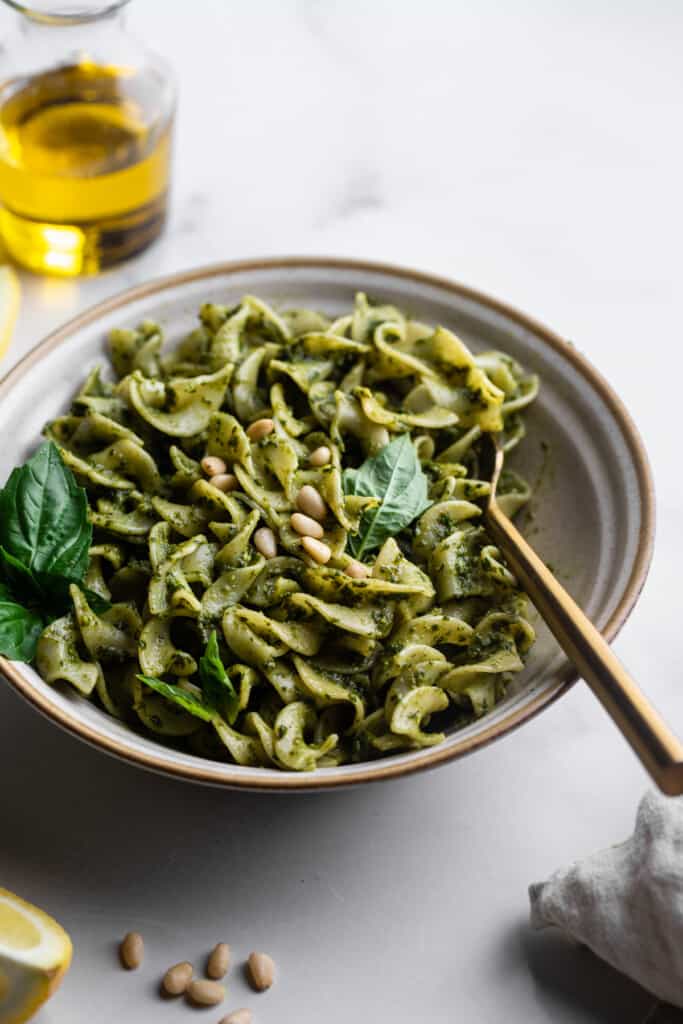 a bowl of pasts with Dairy Free Pesto on it