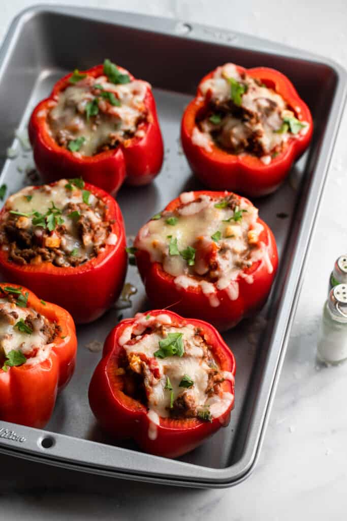 a baking dish fully of cooked Keto Stuffed Peppers