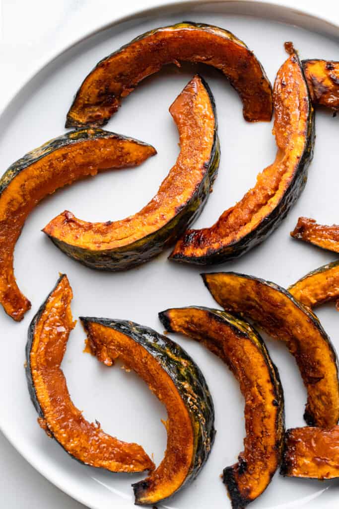 slices of Roasted Kabocha Squash arranged on a plate