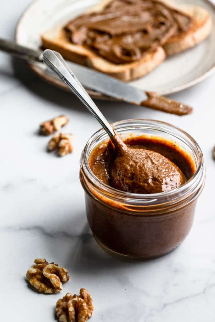a jar of Walnut Butter with a spoon