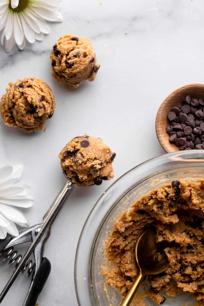 a cookie scoop filled with Healthy Cookie Dough