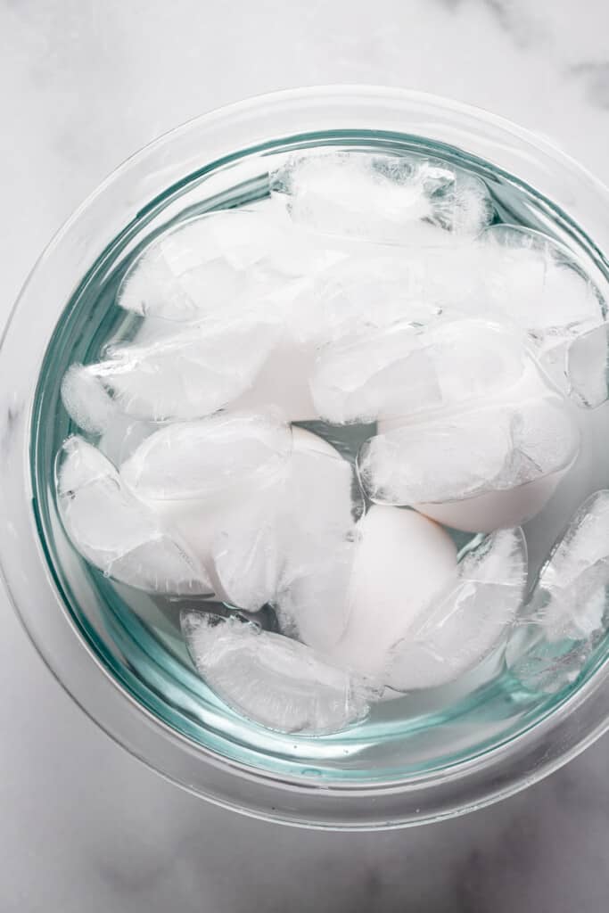 ice water filled with Soft Boiled Eggs in the Microwave