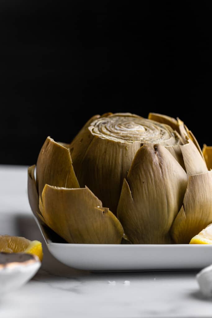 one Instant Pot Artichokes on a small plate