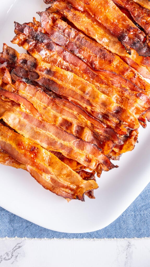 Baked Brown Sugar Bacon - the best bacon you'll ever have! diagonal shot