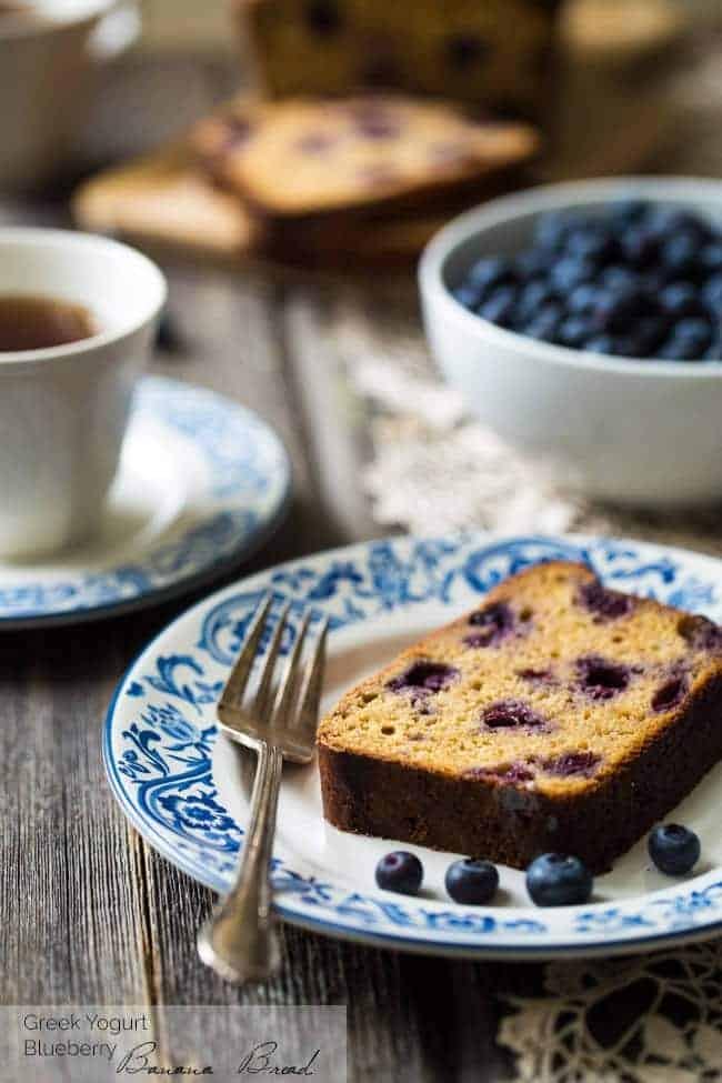 Whole Wheat Banana Bread with Blueberries - No refined sugar, no oil and made with Greek yogurt! This bread is SO good and SO easy! | Foodfaithfitness.com | @FoodFaithFit